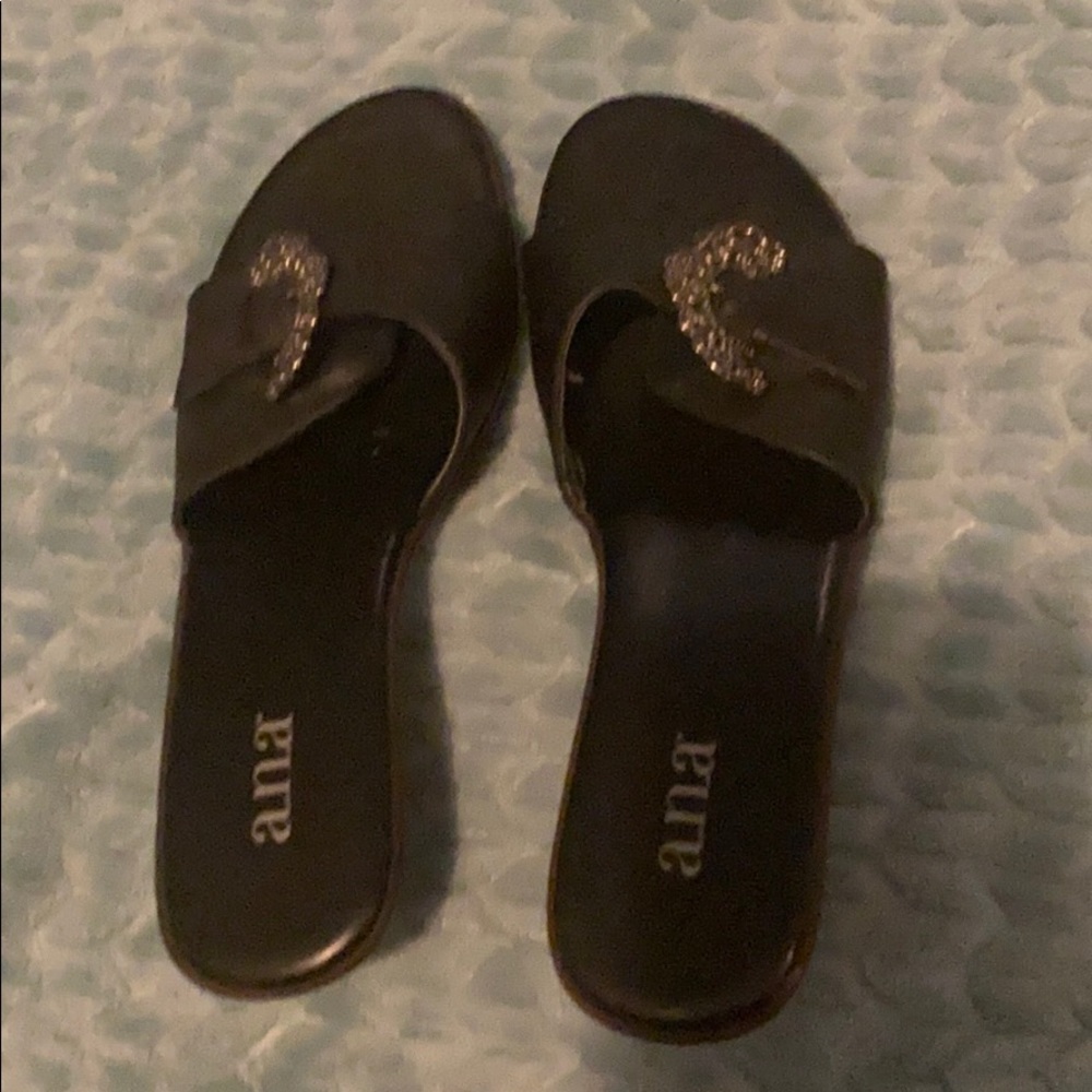 Black sandals with silver detailing